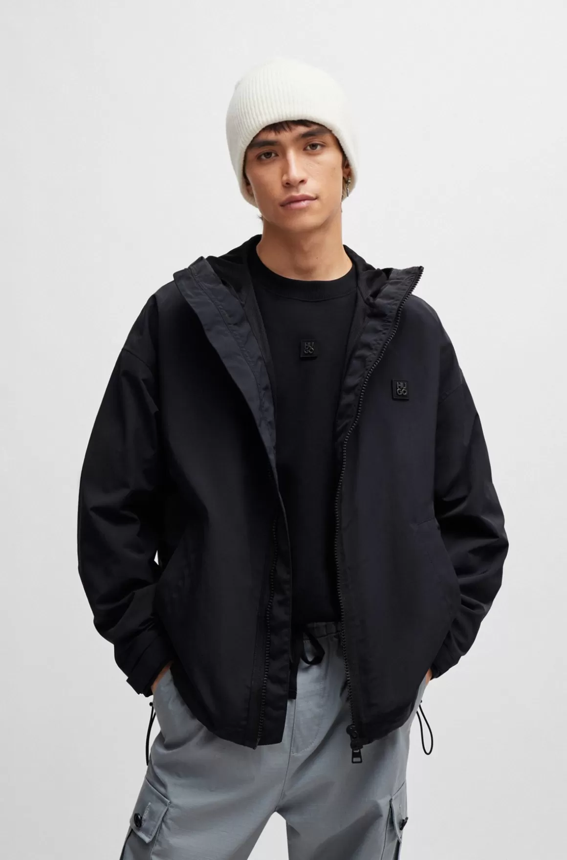 HUGO BOSS Vandskyende Windbreaker Med Hætte Og Mærke Med Stablet Logo